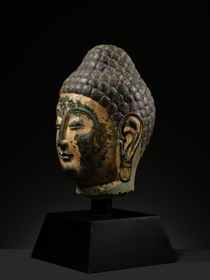 Lot 50 - A RARE AND MAGNIFICENT GILT GREEN MARBLE HEAD OF BUDDHA, NORTHERN QI DYNASTY, 550-577