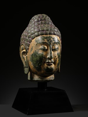 Lot 50 - A RARE AND MAGNIFICENT GILT GREEN MARBLE HEAD OF BUDDHA, NORTHERN QI DYNASTY, 550-577