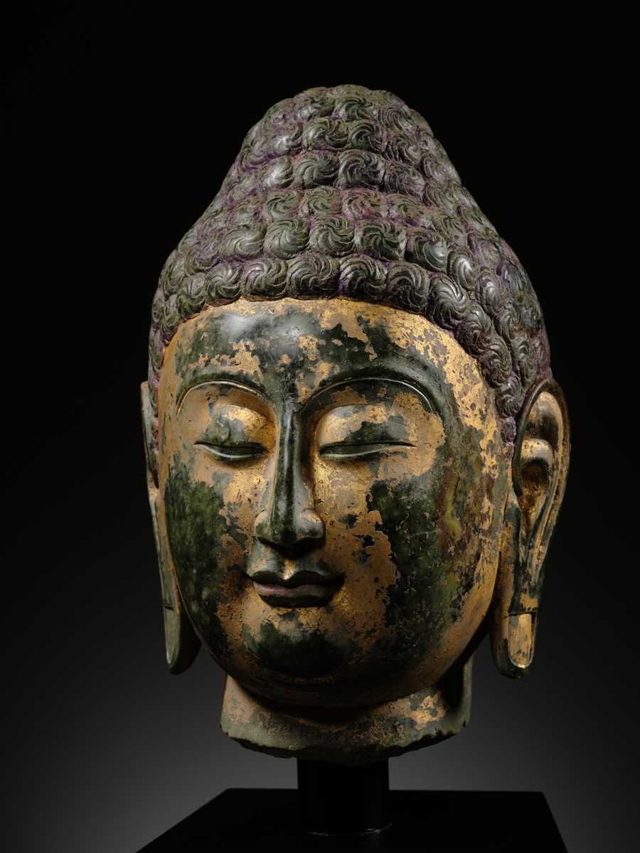Lot 50 - A RARE AND MAGNIFICENT GILT GREEN MARBLE HEAD OF BUDDHA, NORTHERN QI DYNASTY, 550-577