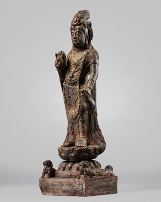 Lot 39 - A PAINTED LIMESTONE FIGURE OF WILLOW GUANYIN, NORTHERN ZHOU-SUI DYNASTY