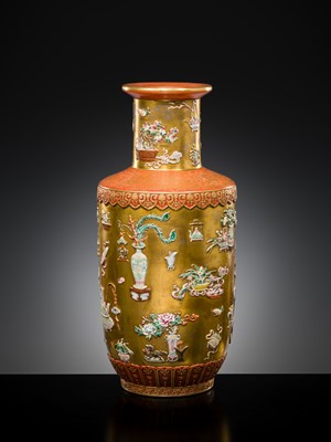 A RELIEF-DECORATED ‘HUNDRED TREASURES’ FAMILLE-ROSE VASE, LATE QING DYNASTY TO REPUBLIC PERIOD