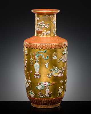 Lot 308 - A RELIEF-DECORATED ‘HUNDRED TREASURES’ FAMILLE-ROSE VASE, LATE QING DYNASTY TO REPUBLIC PERIOD