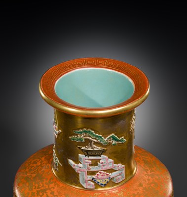 A RELIEF-DECORATED ‘HUNDRED TREASURES’ FAMILLE-ROSE VASE, LATE QING DYNASTY TO REPUBLIC PERIOD