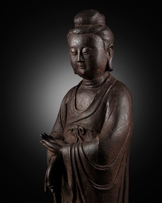 Lot 347 - A LARGE AND IMPRESSIVE CAST-IRON FIGURE OF GUANYIN, LATE MING DYNASTY