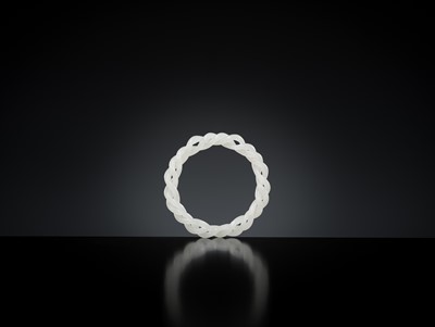 Lot 465 - A WHITE JADE ROPE-TWIST BANGLE, QING DYNASTY