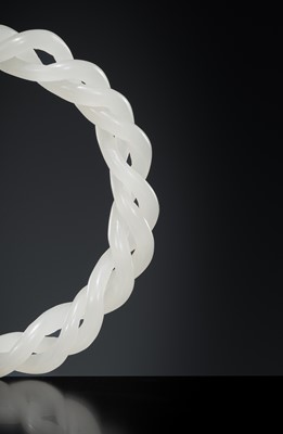 Lot 465 - A WHITE JADE ROPE-TWIST BANGLE, QING DYNASTY