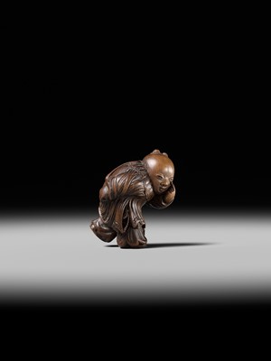 Lot 190 - KAKUHO: A FINE WOOD NETSUKE OF A KARAKO