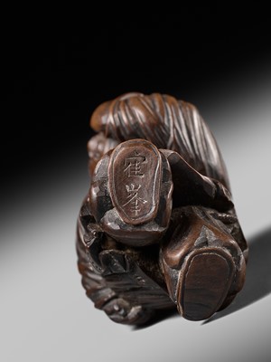 Lot 190 - KAKUHO: A FINE WOOD NETSUKE OF A KARAKO