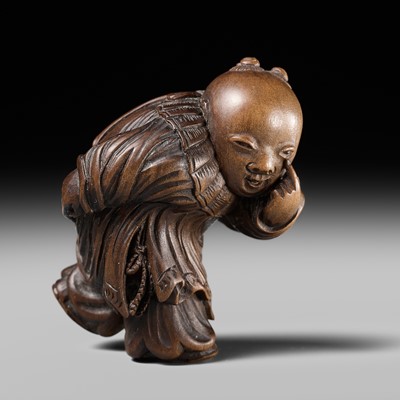 Lot 190 - KAKUHO: A FINE WOOD NETSUKE OF A KARAKO