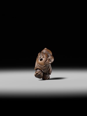 Lot 190 - KAKUHO: A FINE WOOD NETSUKE OF A KARAKO