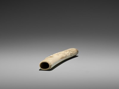 Lot 283 - RYUSAI: A STAG ANTLER KISERUZUTSU WITH BUDDHIST IMAGERY