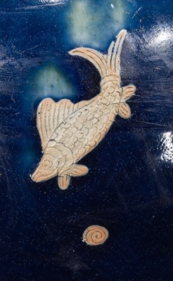 Lot 151 - A BLUE-GLAZED CARVED ‘FISH’ BALUSTER JAR, JIAJING PERIOD, 1521-1567