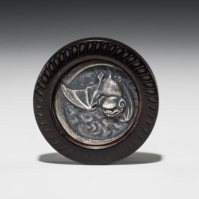 A LARGE SILVER AND EBONY KAGAMIBUTA WITH A BAT AND DRAGON