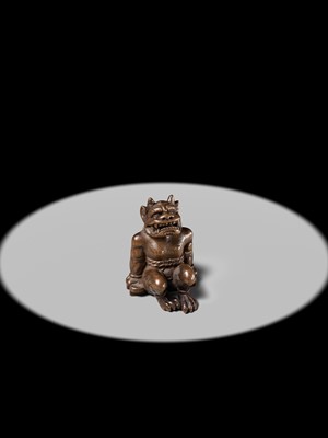 Lot 211 - A RARE WOOD NETSUKE OF A RESTRAINED RAIJIN, CIRCLE OF YORITAKE