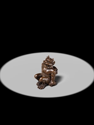 Lot 211 - A RARE WOOD NETSUKE OF A RESTRAINED RAIJIN, CIRCLE OF YORITAKE