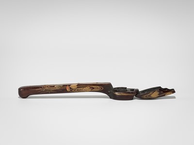 Lot 298 - IKEDA TAISHIN: A FINE GOLD-LACQUERED WOOD YATATE WITH INKCAKE AND BRUSH