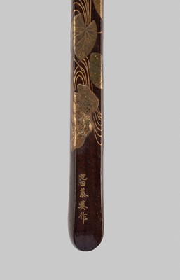 Lot 298 - IKEDA TAISHIN: A FINE GOLD-LACQUERED WOOD YATATE WITH INKCAKE AND BRUSH