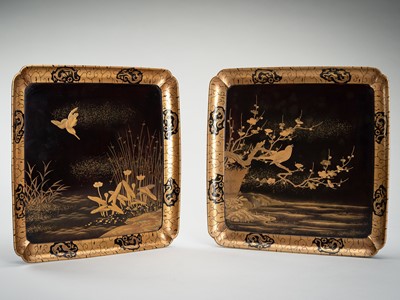 Lot 142 - ZOHIKO: A PAIR OF GOLD LACQUER TRAYS WITH BIRDS