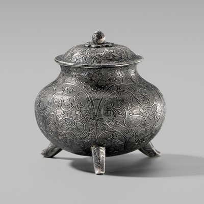 Lot 68 - A SILVER ‘MYTHICAL BEASTS’ TRIPOD JAR AND COVER, TANG DYNASTY