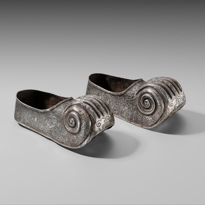 A RARE PAIR OF SILVER REPOUSSÉ WOMEN’S SHOES, TANG TO LIAO DYNASTY