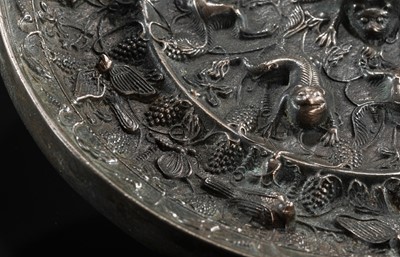 Lot 382 - A LARGE ‘LION AND GRAPEVINE’ BRONZE MIRROR, TANG DYNASTY