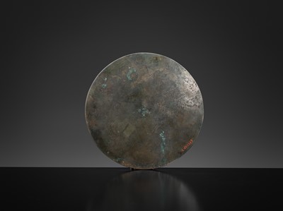 Lot 382 - A LARGE ‘LION AND GRAPEVINE’ BRONZE MIRROR, TANG DYNASTY