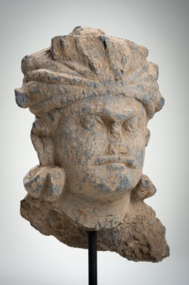 Lot 1248 - A SCHIST HEAD OF A BODHISATTVA, ANCIENT REGION OF GANDHARA, 3RD – 4TH CENTURY