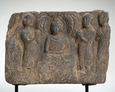 Lot 377 - A SCHIST FRIEZE DEPICTING A MEDITATING BUDDHA, GANDHARA, 2nd – 3rd CENTURY