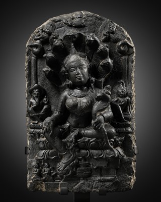 Lot 623 - A BLACK STONE STELE DEPICTING MANASA, PALA PERIOD, 10TH-11TH CENTURY