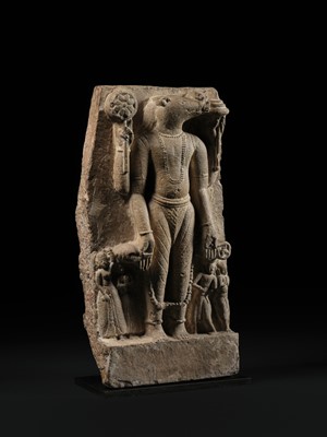 Lot 196 - A PALE PINK SANDSTONE STELE OF VISHNU VARAHA, THE COSMIC BOAR