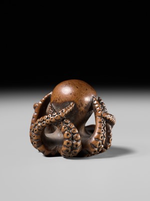 Lot 170 - MASATOMO: A GOOD WOOD NETSUKE OF AN OCTOPUS