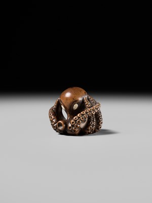 Lot 170 - MASATOMO: A GOOD WOOD NETSUKE OF AN OCTOPUS