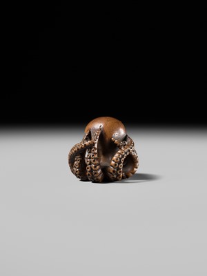 Lot 170 - MASATOMO: A GOOD WOOD NETSUKE OF AN OCTOPUS