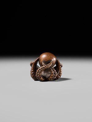 Lot 170 - MASATOMO: A GOOD WOOD NETSUKE OF AN OCTOPUS