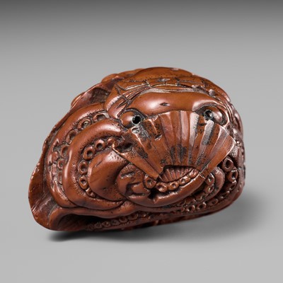 Lot 335 - SHOJU: A RARE KURUMI (WALNUT) NETSUKE WITH OCTOPUS AND AWABI