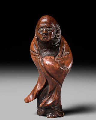 Lot 107 - A FINE LACQUERED WOOD NETSUKE OF DARUMA, ATTRIBUTED TO YOSHIMOTO NISAI