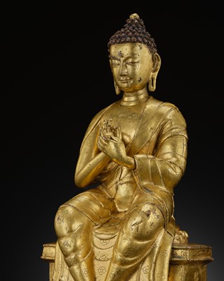 Lot 15 - A RARE GILT-BRONZE FIGURE OF BUDDHA MAITREYA, TIBET, 16TH CENTURY