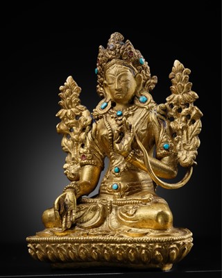 Lot 318 - AN INLAID GILT-BRONZE FIGURE OF WHITE TARA, NEPAL, 19TH CENTURY