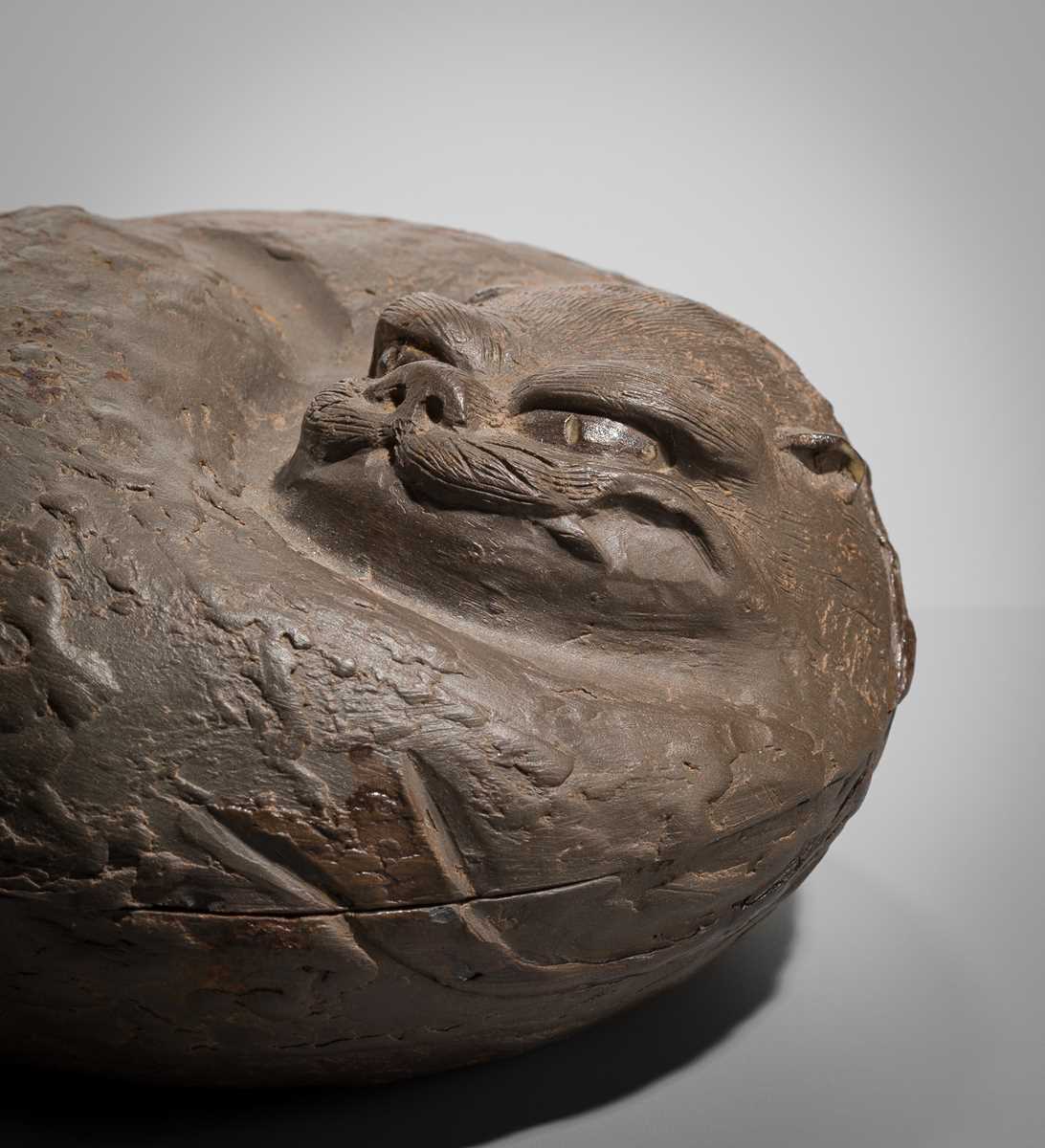 Lot 176 - A STONEWARE BOX AND COVER IN THE FORM OF A TIGER