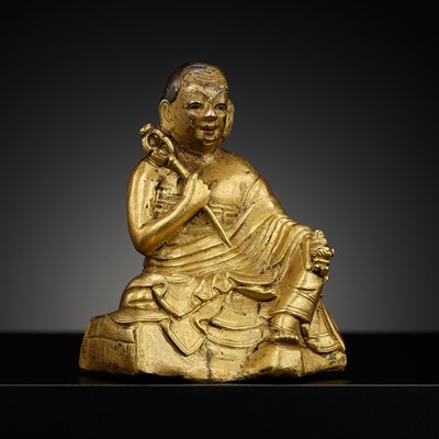 Lot 284 - A GILT-BRONZE FIGURE OF THE ARHAT NAGASENA, TIBET, 17TH-18TH CENTURY