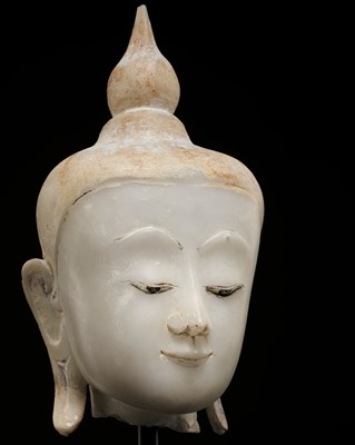 Lot 657 - AN ALABASTER HEAD OF BUDDHA, SHAN STYLE, 17TH-18TH CENTURY