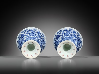 Lot 168 - AN EXCEEDINGLY RARE PAIR OF BLUE AND WHITE ‘EIGHT IMMORTALS’ STEM BOWLS, DAOGUANG MARK AND PERIOD, DATED 1845