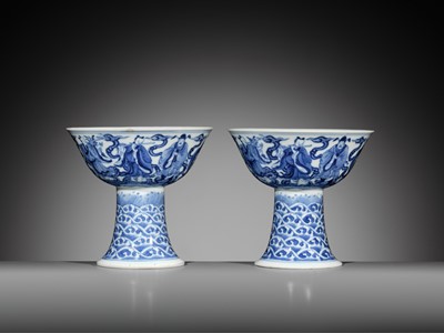 Lot 168 - AN EXCEEDINGLY RARE PAIR OF BLUE AND WHITE ‘EIGHT IMMORTALS’ STEM BOWLS, DAOGUANG MARK AND PERIOD, DATED 1845