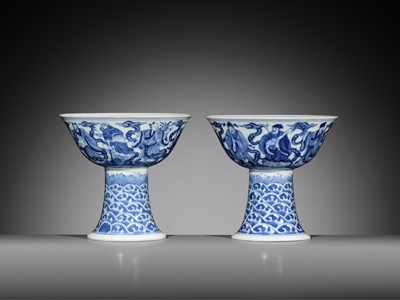 Lot 168 - AN EXCEEDINGLY RARE PAIR OF BLUE AND WHITE ‘EIGHT IMMORTALS’ STEM BOWLS, DAOGUANG MARK AND PERIOD, DATED 1845