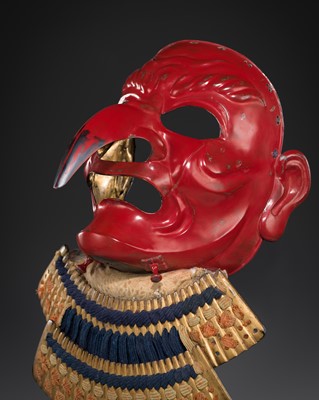 Lot 133 - GEISHU MYOCHIN KIYOYOSHI: A MAGNIFICENT AND RARE RED-LACQUERED IRON TENGU SOMEN