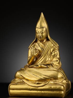 Lot 26 - A GILT-BRONZE FIGURE OF THE SIXTH PANCHEN LAMA, LOBZANG PALDEN YESHE