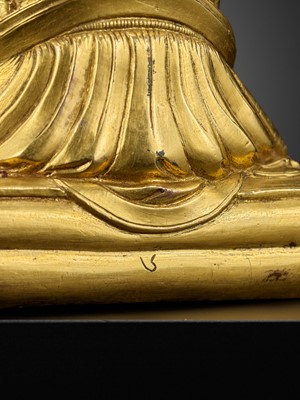 Lot 26 - A GILT-BRONZE FIGURE OF THE SIXTH PANCHEN LAMA, LOBZANG PALDEN YESHE