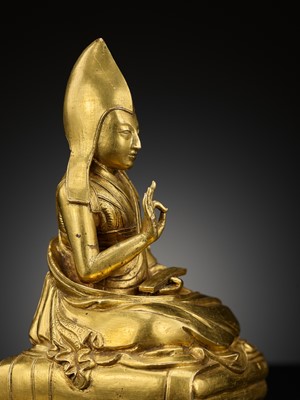 Lot 26 - A GILT-BRONZE FIGURE OF THE SIXTH PANCHEN LAMA, LOBZANG PALDEN YESHE