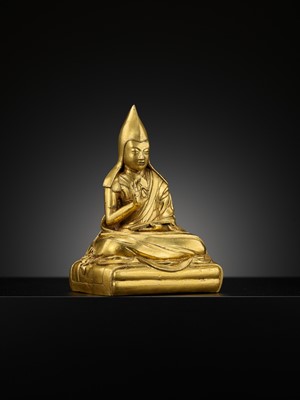 Lot 26 - A GILT-BRONZE FIGURE OF THE SIXTH PANCHEN LAMA, LOBZANG PALDEN YESHE