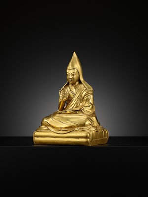 Lot 26 - A GILT-BRONZE FIGURE OF THE SIXTH PANCHEN LAMA, LOBZANG PALDEN YESHE